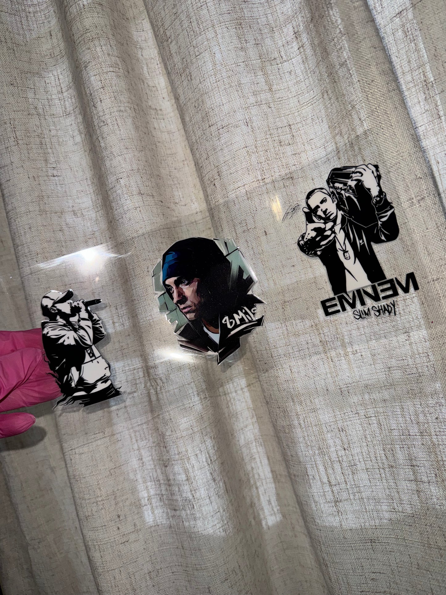 Em