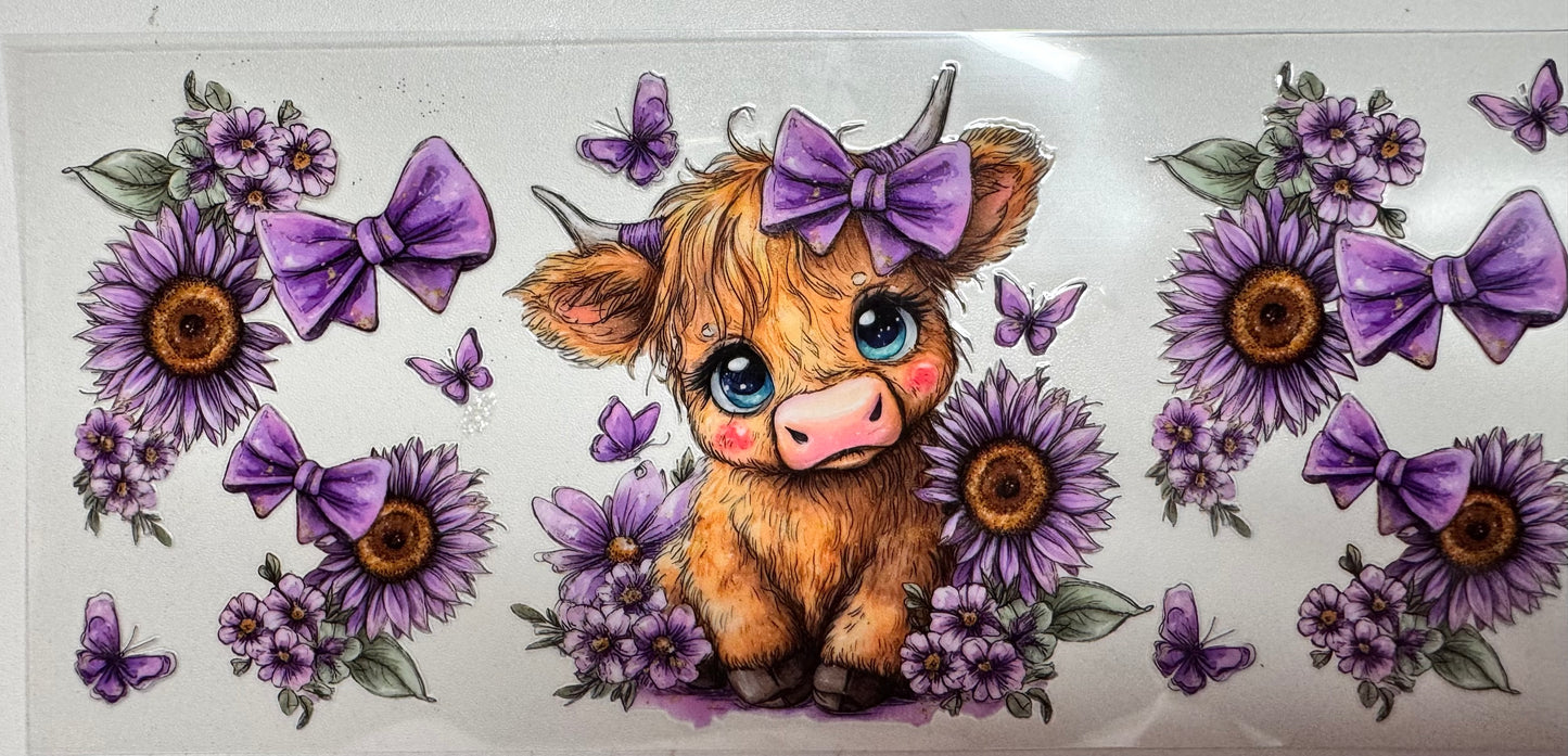 Cow with purple bow